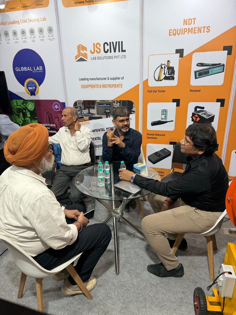 Global Lab founders Avadhesh Sharma and Hiren Joshi with industry visitors at World of Concrete India 2026